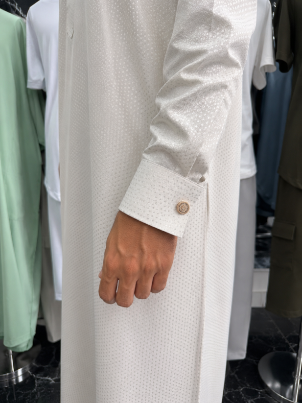 qamis qatari bouton manche